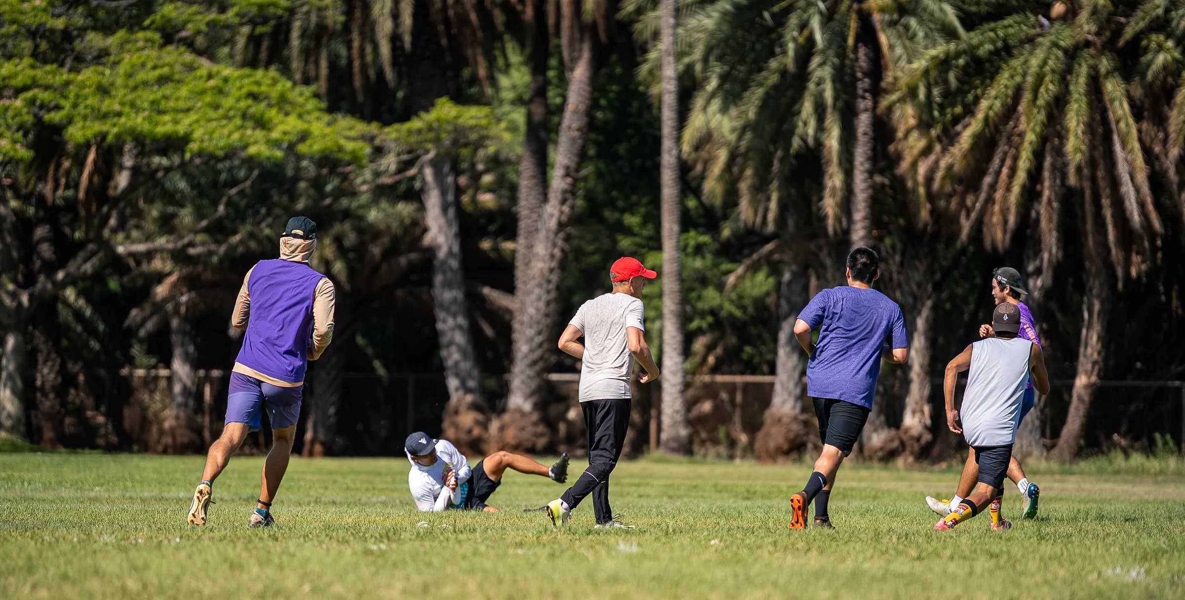 An ultimate player receiving a disc during a game